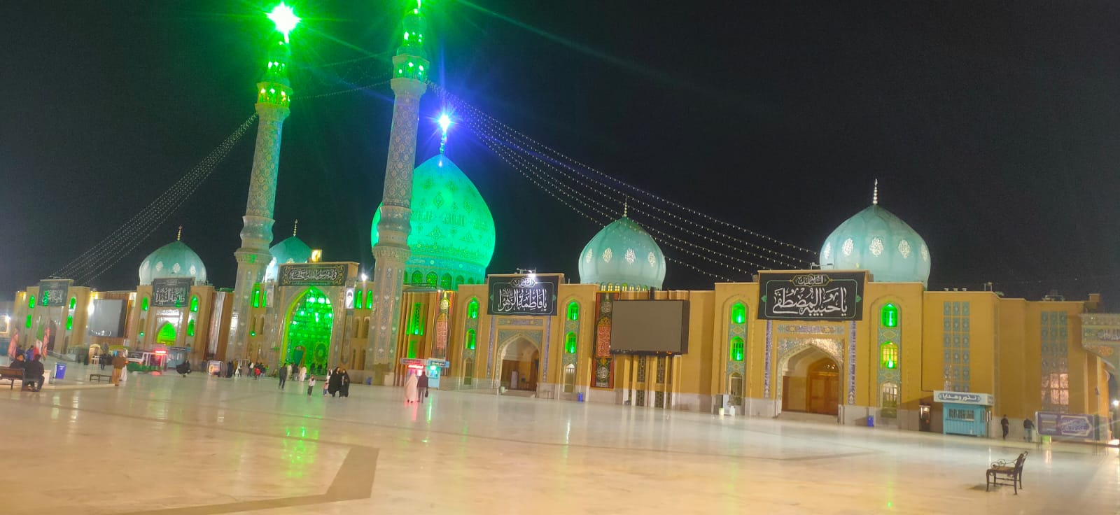Tourists exploring Baghdad landmarks
